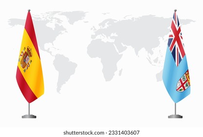 Spain and Fiji flags for official meeting against background of world map.