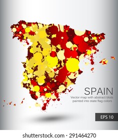 Spain vector map with abstract blots painted into state flag colors. Vector illustration.