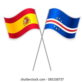 Spanish and Cabo Verdean crossed flags. Spain combined with Cape Verde isolated on white. Language learning, international business or travel concept.