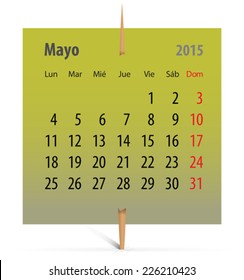 Spanish calendar for May 2015 on a green sticker attached with toothpick. Vector illustration