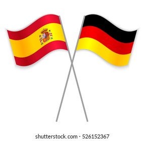 Spanish and German crossed flags. Spain combined with Germany isolated on white. Language learning, international business or travel concept.