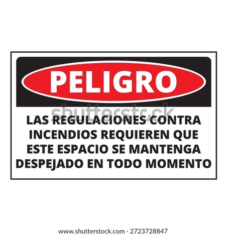 Spanish language danger fire regulations demand that this place be clear at all times sign
