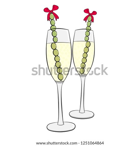Spanish New Year. Two cups of champagne with grapes. Spanish New Year's tradition.