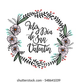 Spanish Phrase Happy Valentines Day. Feliz San Valentin. Hand Lettering Greeting Card  with Floral Wreath. Modern Calligraphy. Vector Illustration.