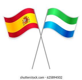 Spanish and Sierra Leonean crossed flags. Spain combined with Sierra Leone isolated on white. Language learning, international business or travel concept.