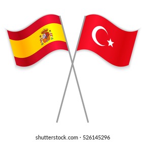 Spanish and Turkish crossed flags. Spain combined with Turkey isolated on white. Language learning, international business or travel concept.