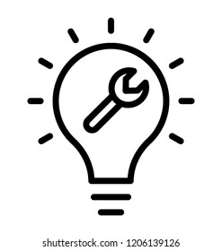 Spanner inside a sparkling bulb is icon for idea development