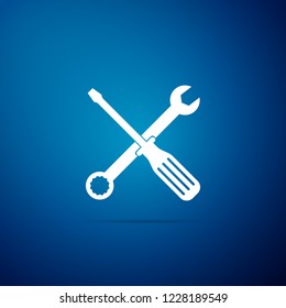 Spanner and screwdriver tools icon isolated on blue background. Service tool symbol. Flat design. Vector Illustration