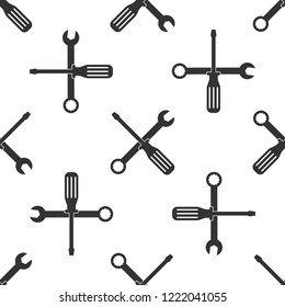 Spanner and screwdriver tools icon seamless pattern on white background. Service tool symbol. Flat design. Vector Illustration