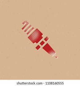 Spark plug icon in halftone style. Grunge background vector illustration.
