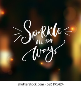 Sparkle all the way. Christmas inspirational saying on dark background with lights and bokeh. Vector quote for greeting card and photo overlays