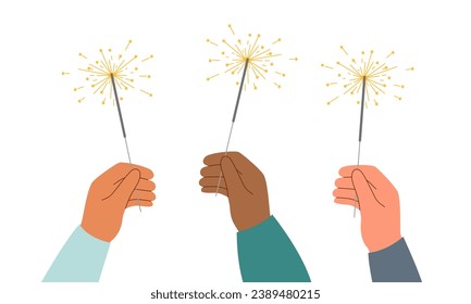 Sparklers in human hands on white background. Hands holding burning sparklers. Holiday concept.