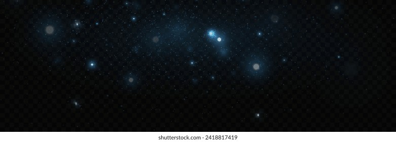 Sparkles of fairy dust and blue stars shine with a special light. Particles of glare of light.