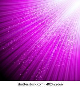Sparkling background with glowing rays and shiny glitter