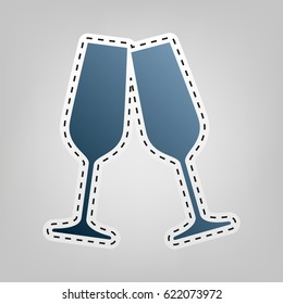 Sparkling champagne glasses. Vector. Blue icon with outline for cutting out at gray background.