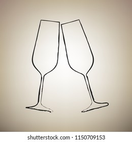 Sparkling champagne glasses. Vector. Brush drawed black icon at light brown background.