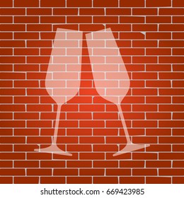 Sparkling champagne glasses. Vector. Whitish icon on brick wall as background.