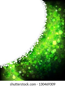 Sparkling clover on an abstract background with place for text.  St. Patrick's Day abstract background
