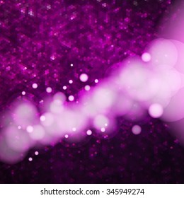 Sparkling glitter texture background with glows and bokeh