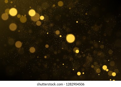 Sparkling gold particles explosion, shiny glittering, golden dust effect abstract background