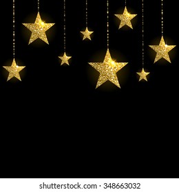 sparkling gold stars on a black background