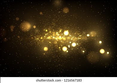 Sparkling golden dust on black. Shiny glittering effect. Abstract glowing light luxury background