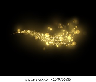 
Sparkling golden magic light on black. Glowing gold dust, shiny glittering effect. 