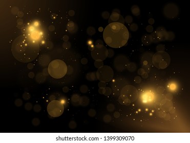 Sparkling golden magic star comet on black background. White sparks and stars glitter special light effect. Cosmic glittering wave. Christmas flash.
