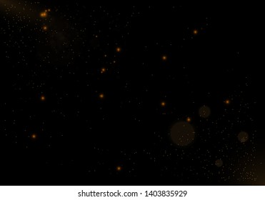 Sparkling golden magic star comet on black background. White sparks and stars glitter special light effect. Cosmic glittering wave. Christmas flash.