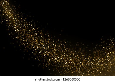 Sparkling golden particles explosion. Glowing bokeh lights abstract background