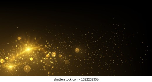 Sparkling golden particles explosion on dark. Glowing light effect abstract magical background.