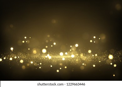 Sparkling golden particles on dark. Abstract luxury background