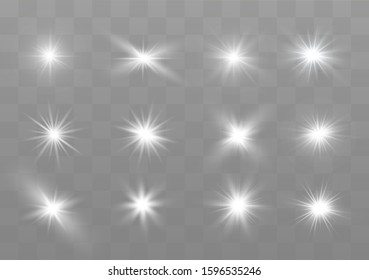 Sparkling magic dust particles. The light of a star. star glow on a transparent background explodes on a transparent background. White light.  Bright Star.