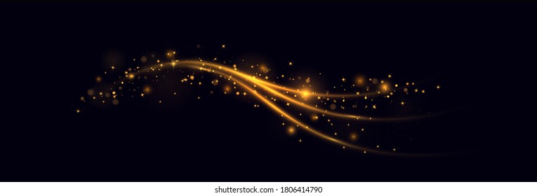 Sparkling magic dust particles.Yellow dust yellow sparks and golden stars shine with special light. Dynamic golden trail. Christmas light effect. Glittering bright trail on black background.