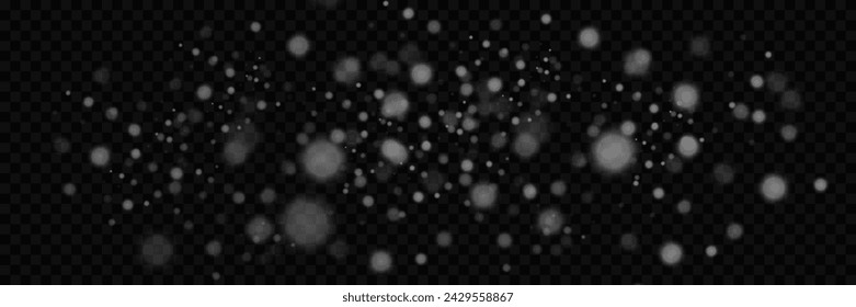 Sparkling magical dust particles. White sparkles sparkle with a special lighting effect.