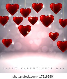 Sparkling Valentine's background with hanging red glass hearts