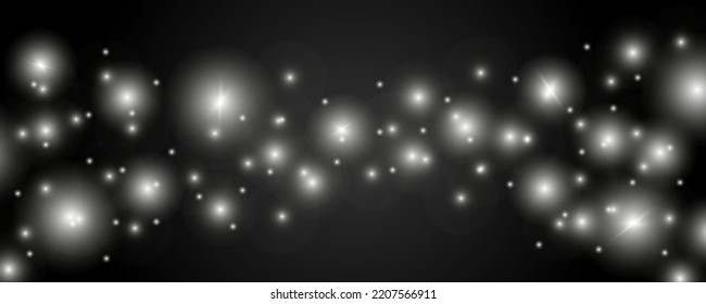 Sparks and stars shine with special light. Sparkling magical dust particles. The effect of a flare flare with a beam of light and magical brilliance. A comet on the sky.