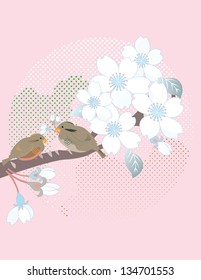 Sparrows on a branch blooming cherry