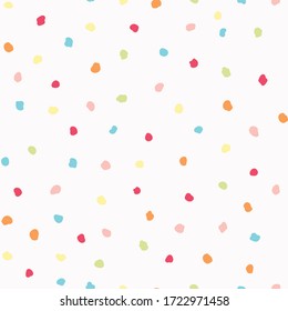 Sparse confetti dotty paper texture seamless background. Tiny colored flecked sprinkles isolated on white. Modern cute falling speckle pattern. Japanese kawaii minimal digital party scrapbook paper