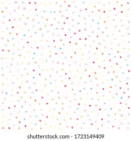 Sparse confetti dotty paper texture background. Tiny colored flecked sprinkles isolated on white. Modern cute falling speckle pattern. Japanese kawaii minimal digital party scrapbook paper