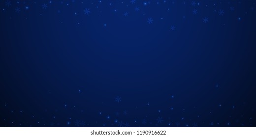 Sparse glowing snow Christmas background. Subtle flying snow flakes and stars on dark blue night background. Amusing winter silver snowflake overlay template. Unequaled vector illustration.