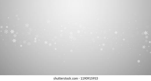 Sparse snowfall Christmas background. Subtle flying snow flakes and stars on light grey background. Attractive winter silver snowflake overlay template. Pleasing vector illustration.
