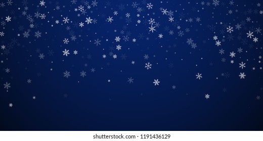 Sparse snowfall Christmas background. Subtle flying snow flakes and stars on dark blue night background. Attractive winter silver snowflake overlay template. Decent vector illustration.