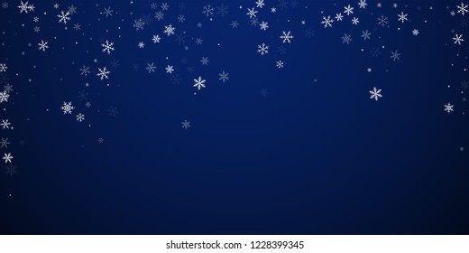 Sparse snowfall Christmas background. Subtle flying snow flakes and stars on dark blue night background. Awesome winter silver snowflake overlay template. Likable vector illustration.