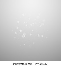 Sparse snowfall Christmas background. Subtle flying snow flakes and stars on light grey background. Beauteous winter silver snowflake overlay template. Lively vector illustration.