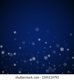 Sparse snowfall Christmas background. Subtle flying snow flakes and stars on dark blue night background. Alluring winter silver snowflake overlay template. Glamorous vector illustration.