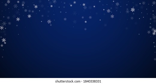Sparse snowfall Christmas background. Subtle flying snow flakes and stars on dark blue night background. Attractive winter silver snowflake overlay template. Ideal vector illustration.