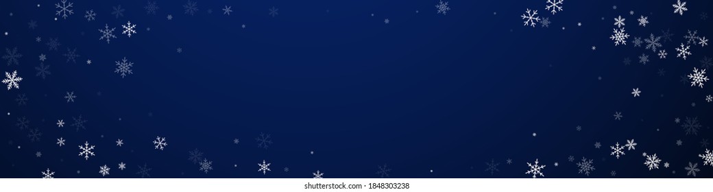 Sparse snowfall Christmas background. Subtle flying snow flakes and stars on dark blue background. Captivating winter silver snowflake overlay template. Ideal panoramic illustration.