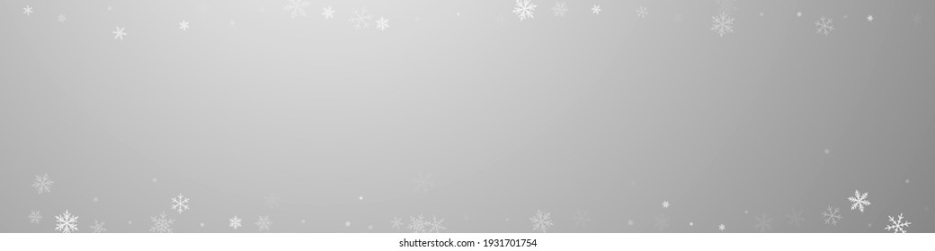 Sparse snowfall Christmas background. Subtle flying snow flakes and stars on grey background. Bizarre winter silver snowflake overlay template. Majestic panoramic illustration.