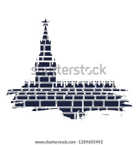 Spasskaya Tower of Kremlin and part of the wall in Moscow. Grunge brush. Ancient brick wall texture
